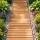 Gardeon 8FT Cedar Garden Pathway: Weather-Resistant, Anti-Slip Roll-Out Walkway with Stakes for Easy Storage & Transport