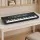 Alpha 61-Key Black Digital Piano Keyboard for Kids with LED Display, 100 Rhythms, 100 Tones, and Microphone Included