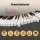 Alpha 88-Key Electric Keyboard Piano with Bluetooth, 900 Tones, Learning Mode and Storage Bag Black