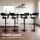 Artiss 4x Bar Stools Gas Lift PU Leather with Armrest, 62-82cm Adjustable Height, All Black, Steel Base