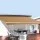 Instahut Motorised Retractable Folding Arm Awning 2.5Mx2M, UV-Resistant Beige Polyester, Remote Control, Aluminium Frame